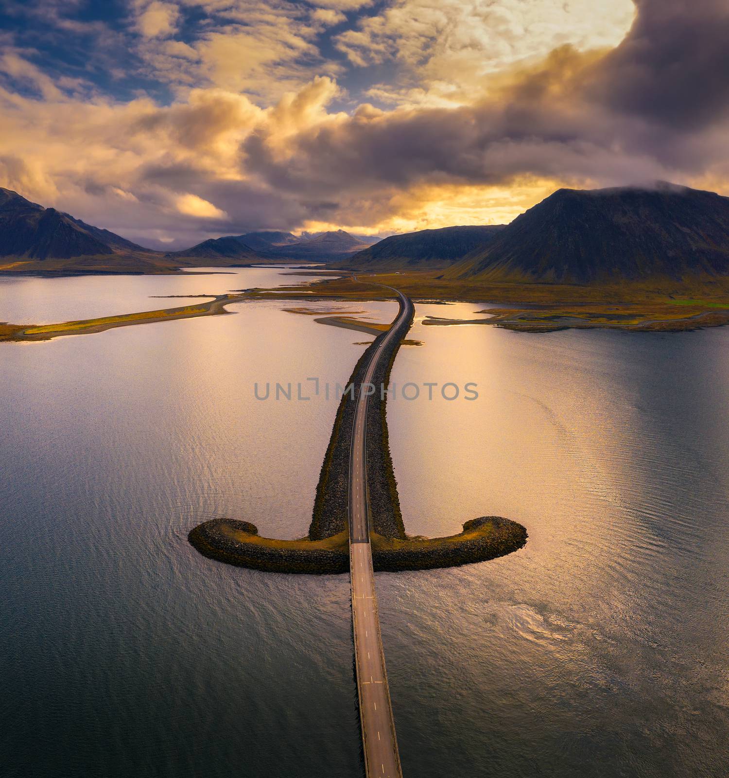 Aerial view of an iconic bridge in west Iceland at sunset by nickfox