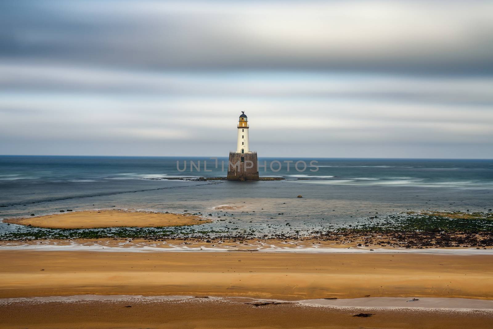 Rattray Head Lighthouse on the north east coast of Scotland, United Kingdom. Long exposure.