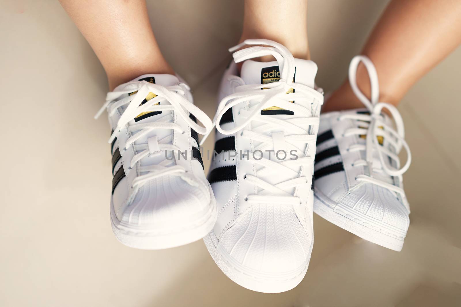 Bangkok ,Thailand,July 18 ,2018-Three white sneaker shoes brand Adidas