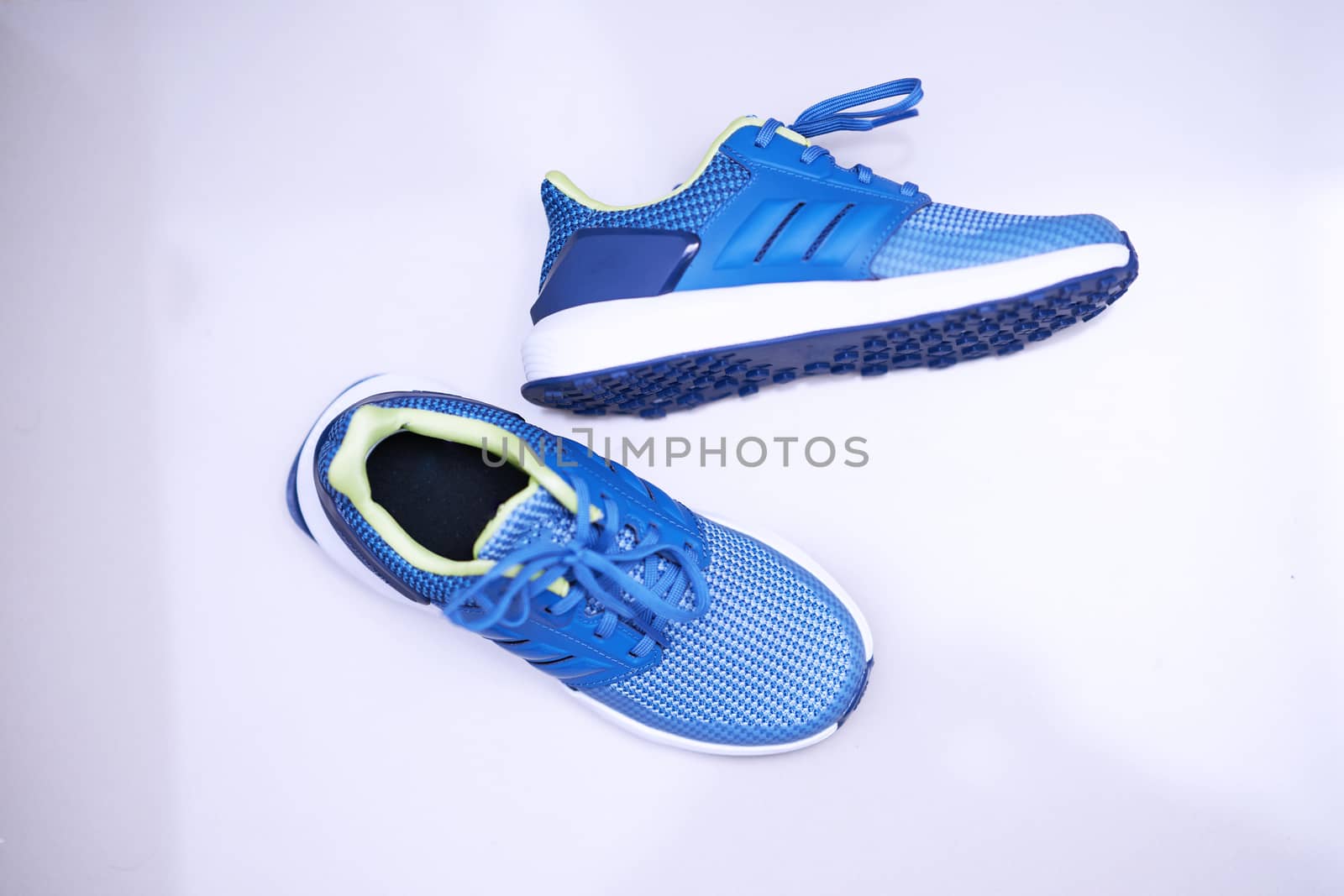 Blue sport shoes  on white isolated  background