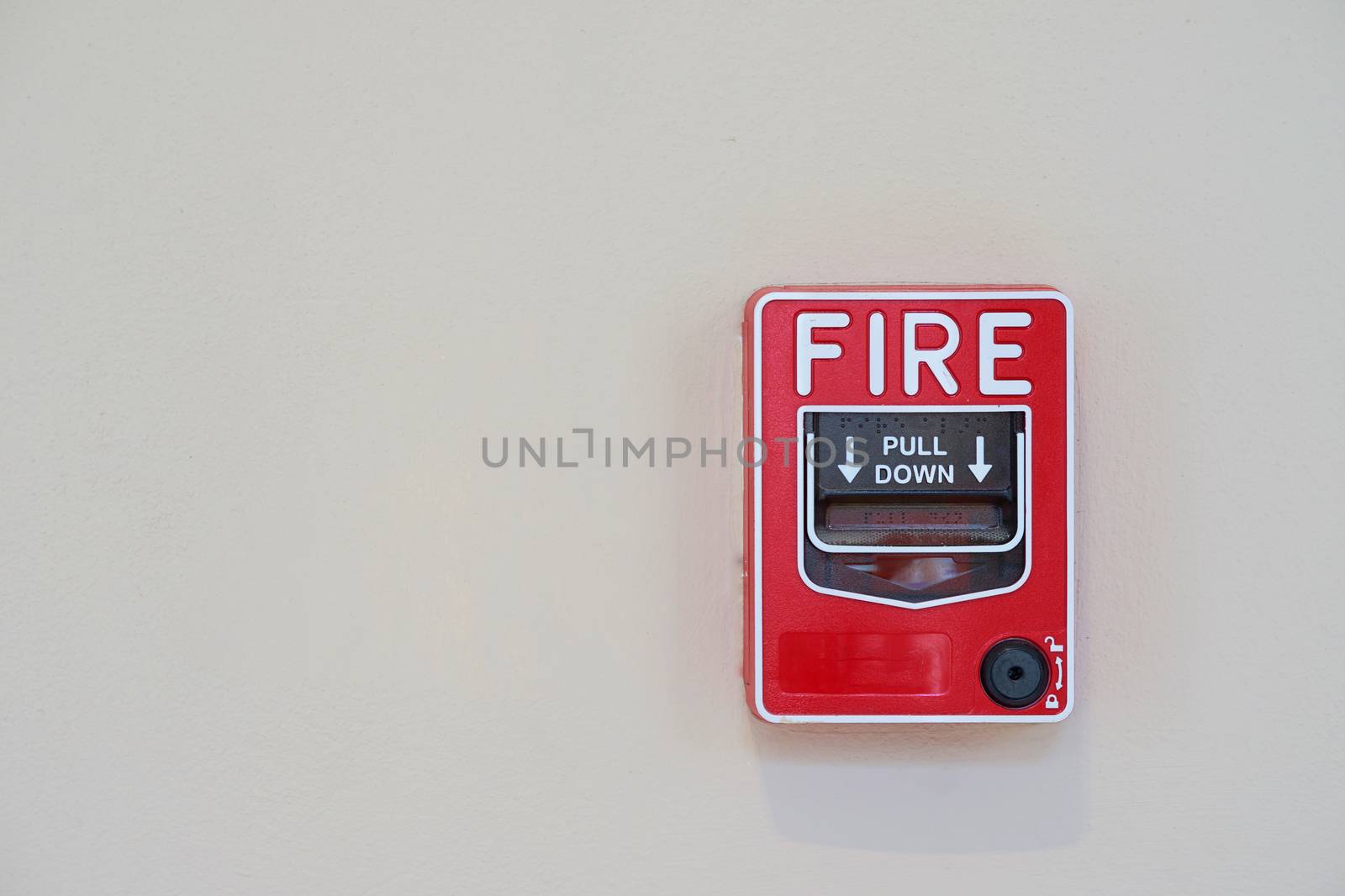 Fire or smoke alarm switch on wall