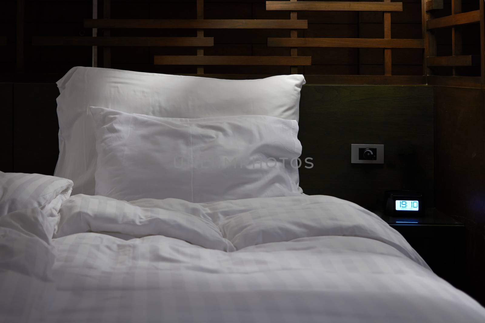 mess bed in hotel room in cleaning and prepare room for customer concept
