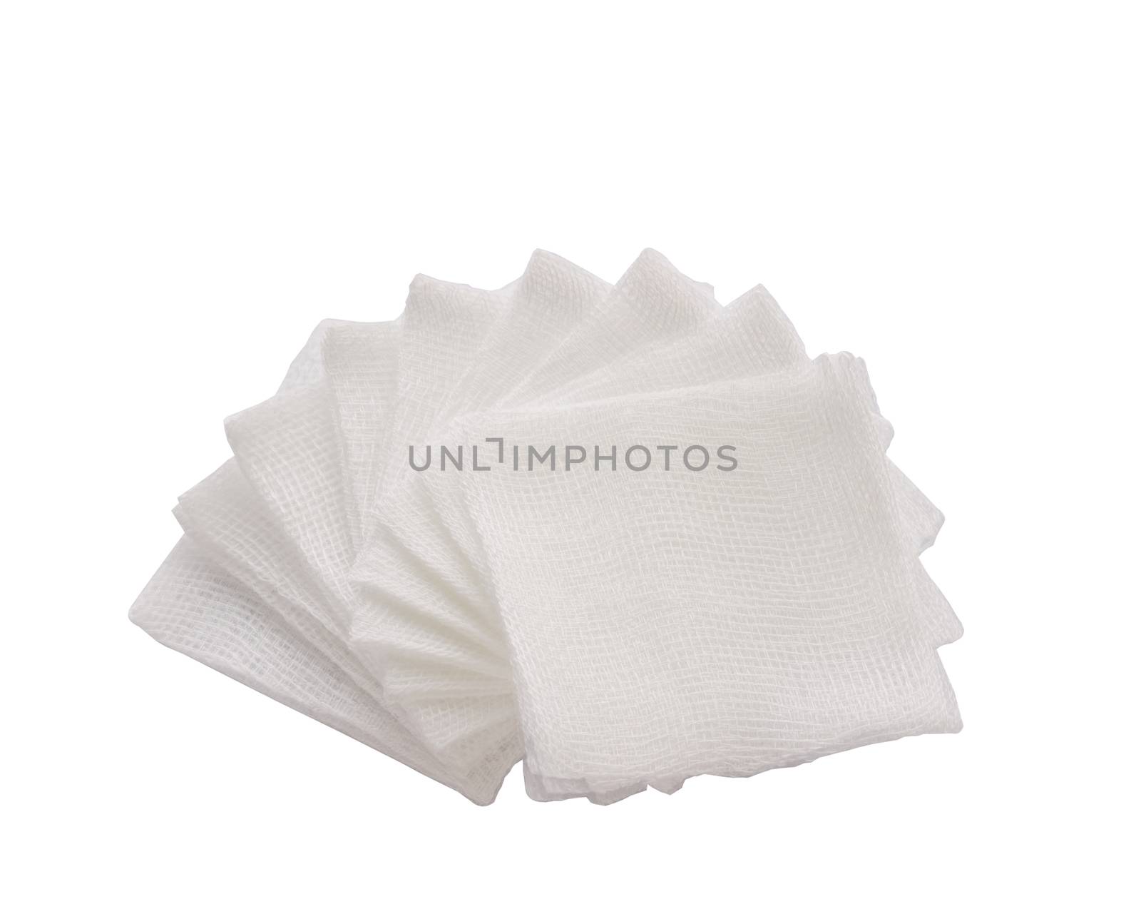Pile of pad gauzes on isolated white background.jpg