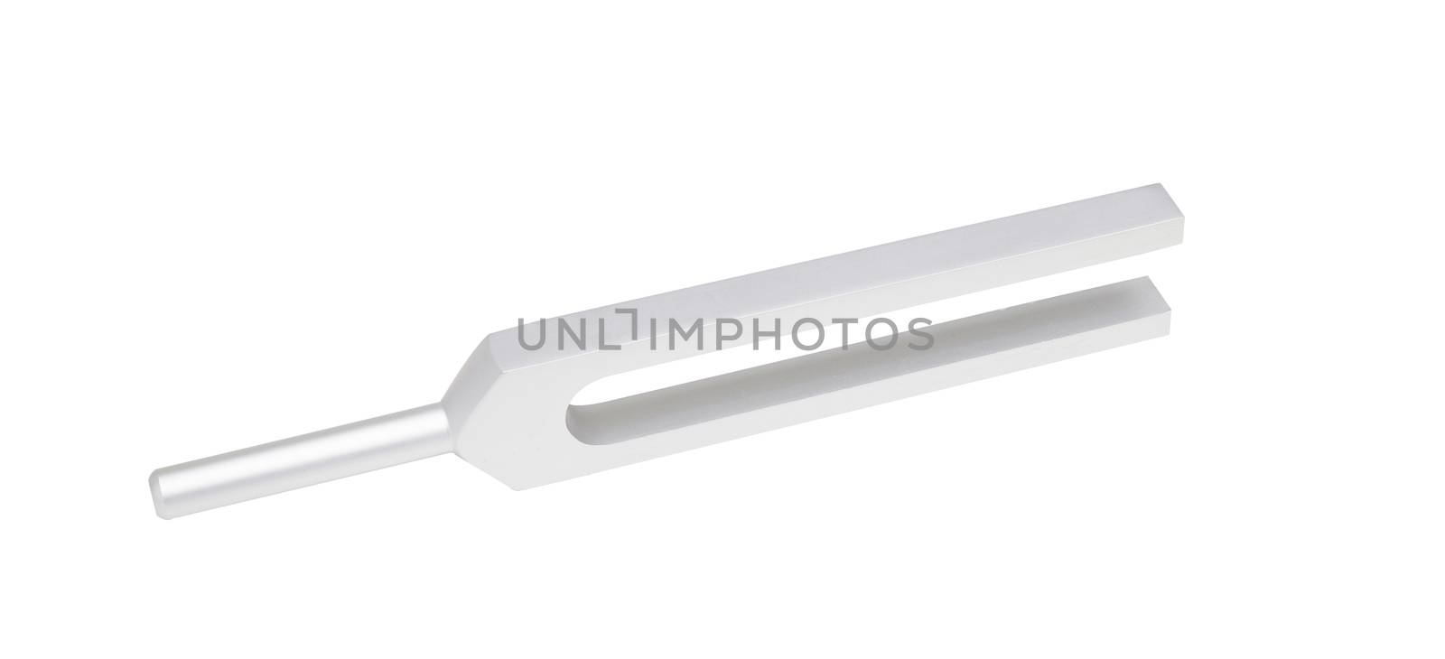 Tuning fork in side up position on isolated white background