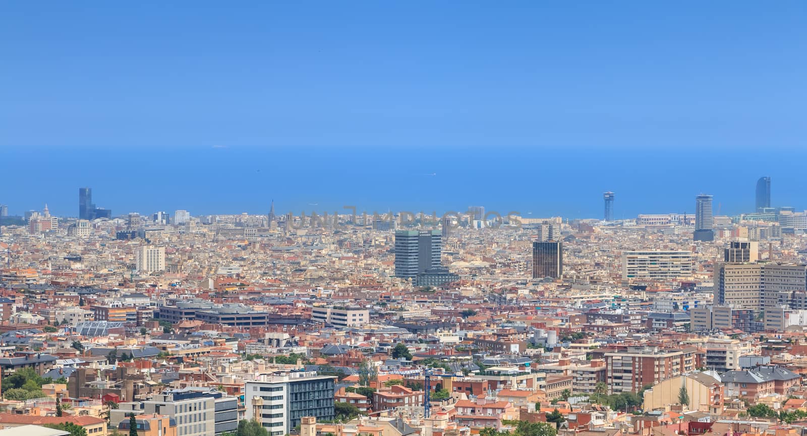 BARCELONA, SPAIN - June 21, 2017 : aerial view of Barcelona from the mountains on a summer day