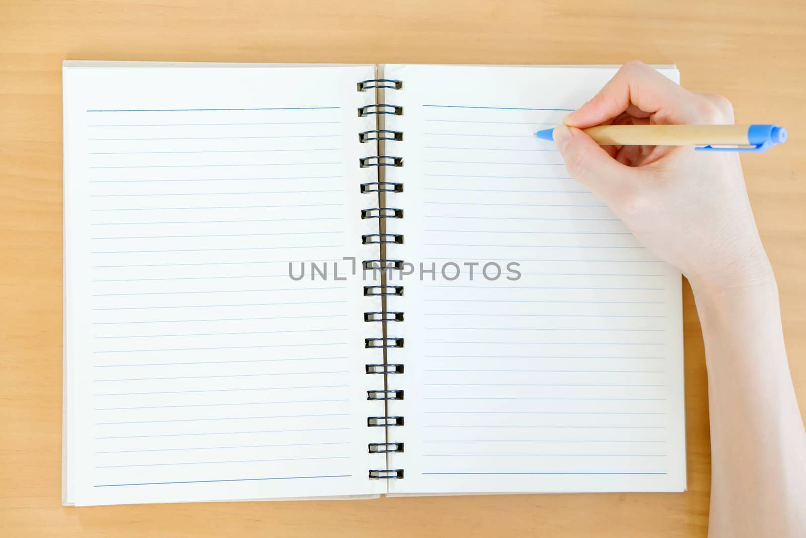 Hands open Blank catalog, magazines,book mock up on wood table