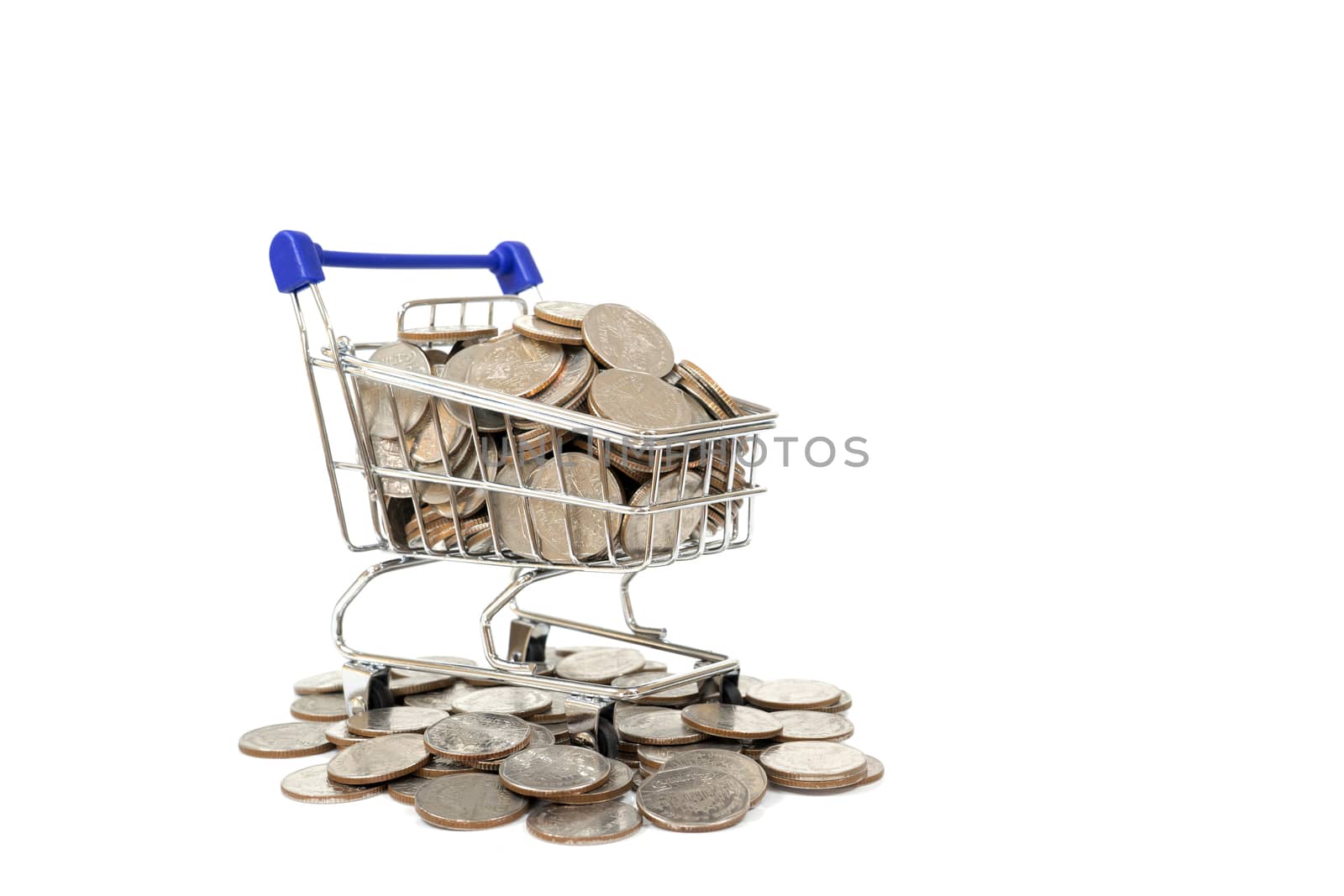 coins in shopping cart on the white background