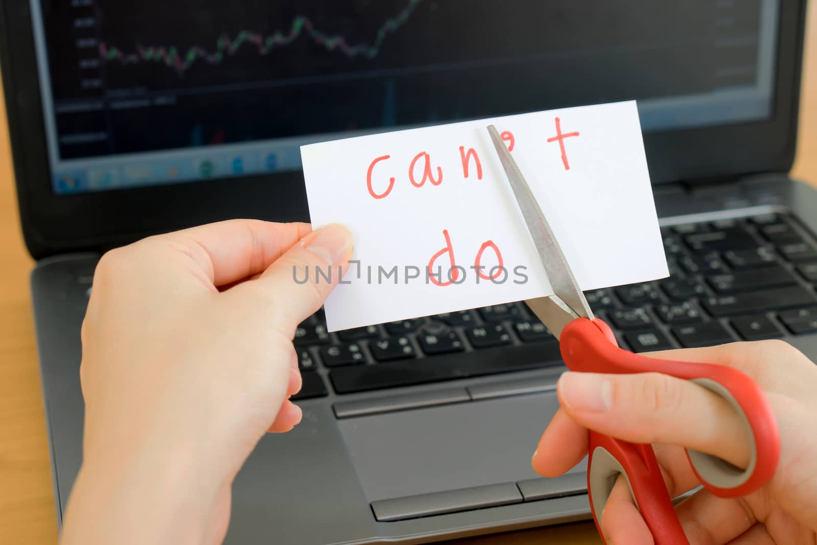 holds card with text can't do on computer