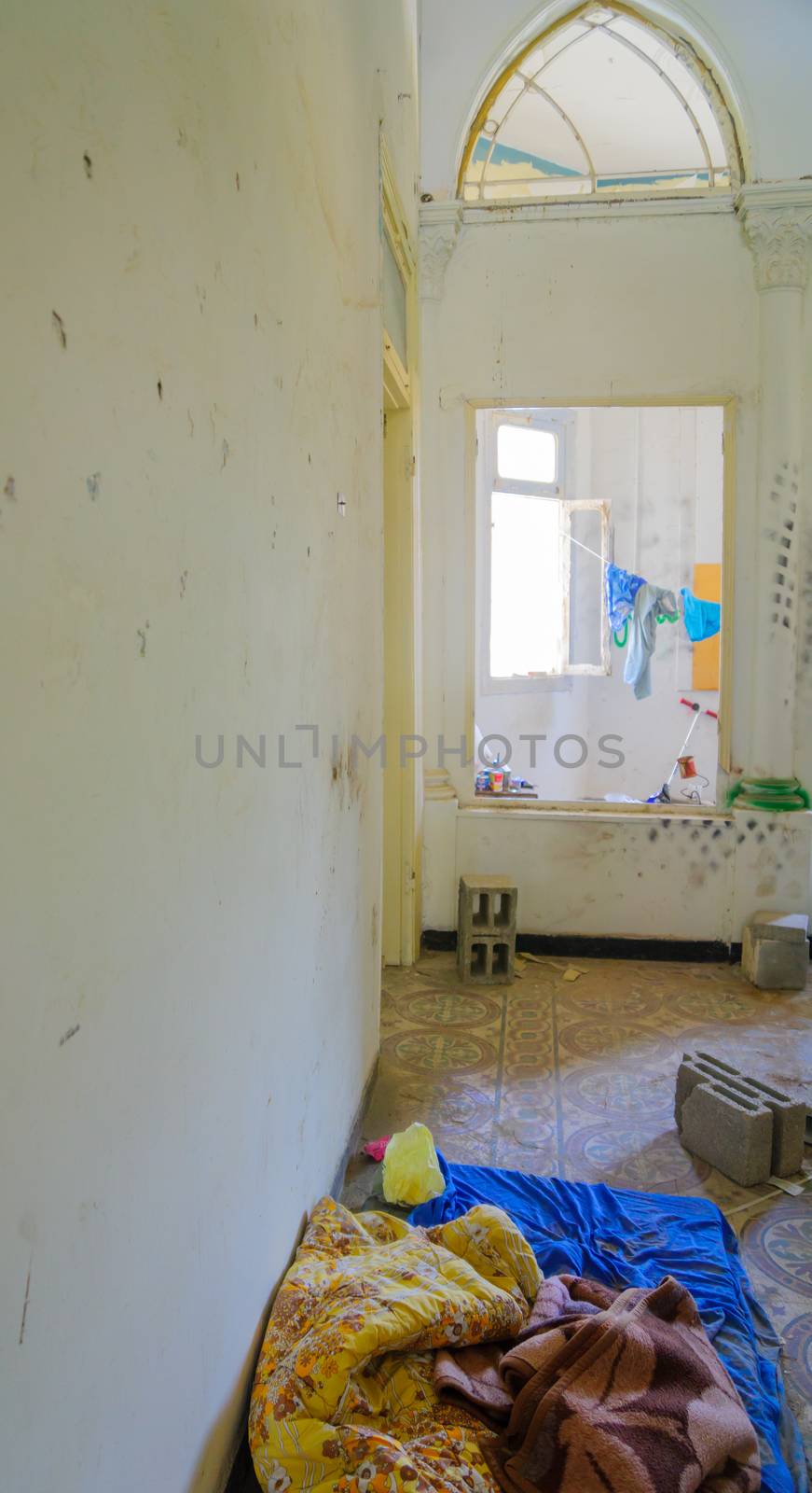 TEL-AVIV, ISRAEL - MAY 27, 2016: A deserted old house, used by young homeless as a shelter. In Jaffa, Southern part of Tel-Aviv Yafo, Israel