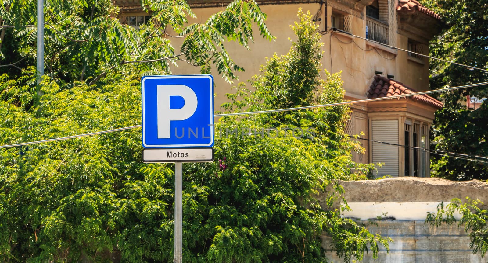 closeup of a parking for scooter in the city center on a summer  by AtlanticEUROSTOXX