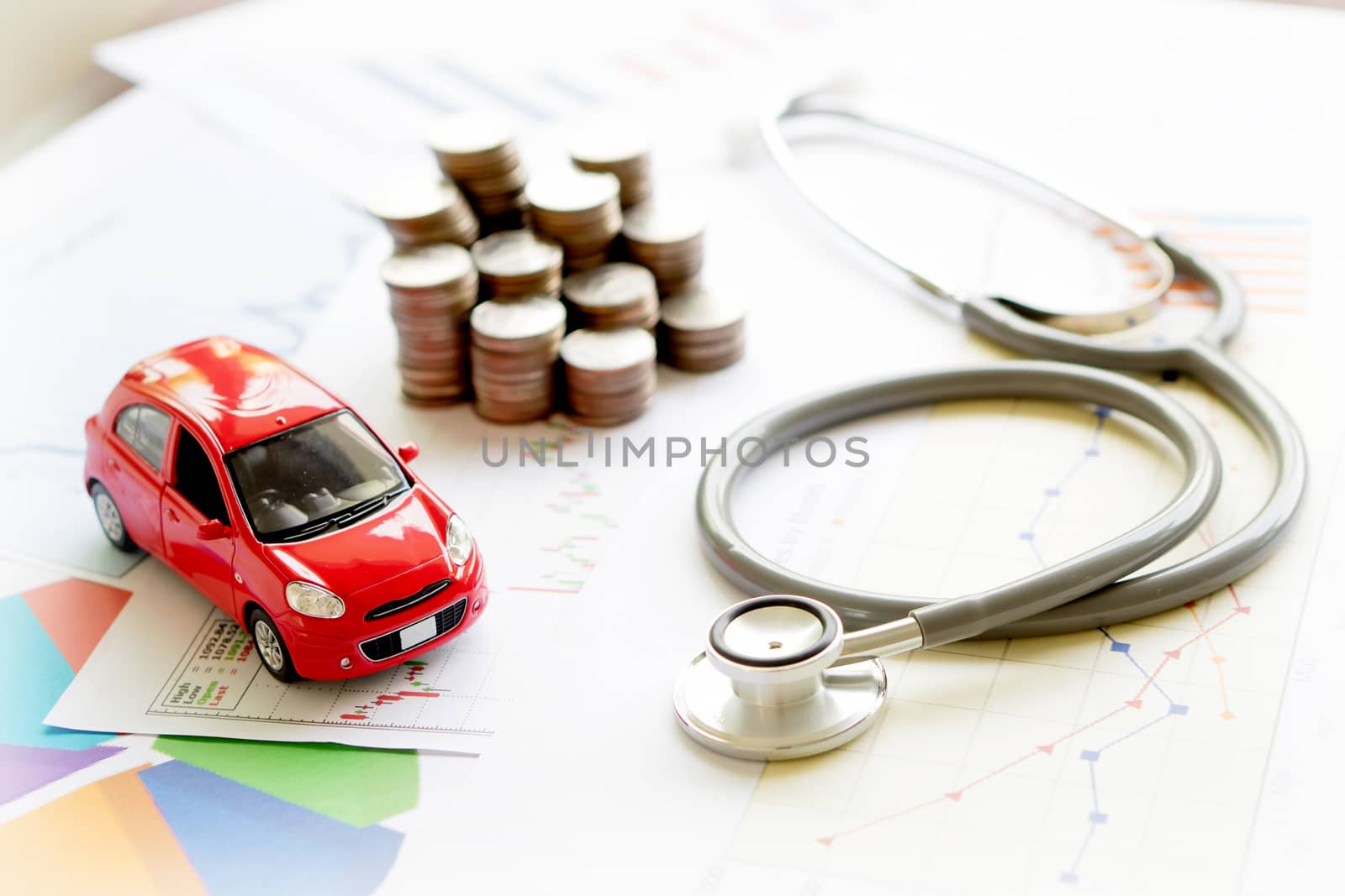 stethoscope car graph and coin