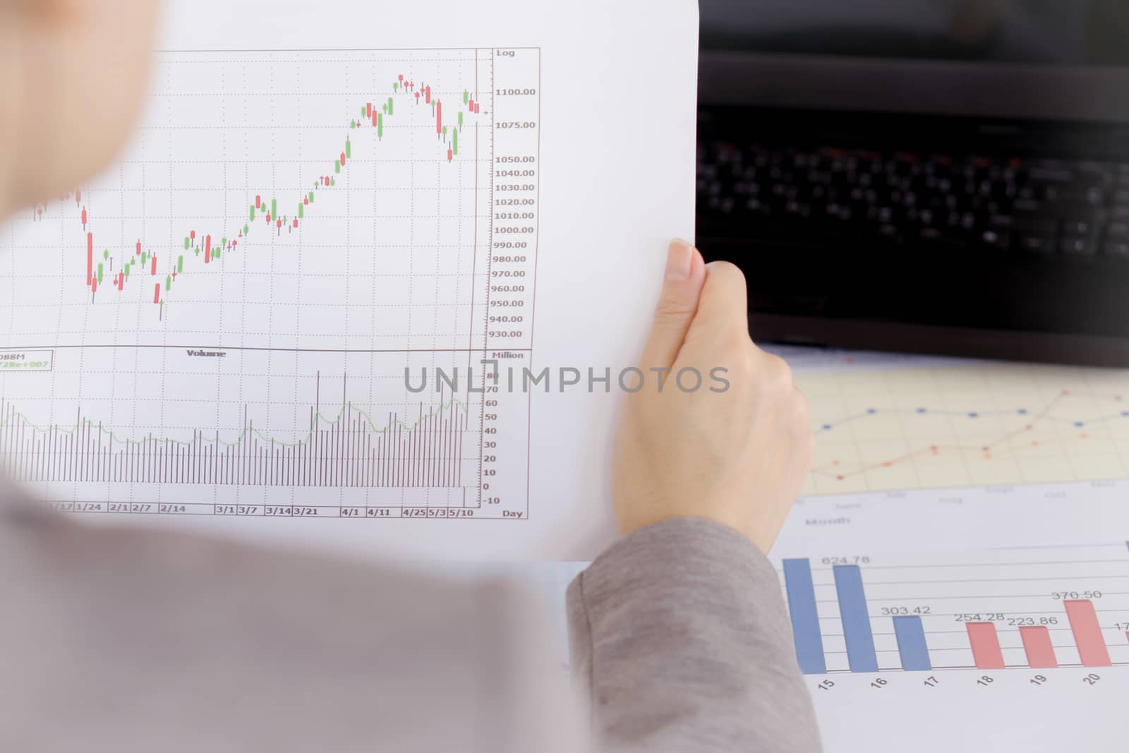 Businesswoman Looking At Financial Report