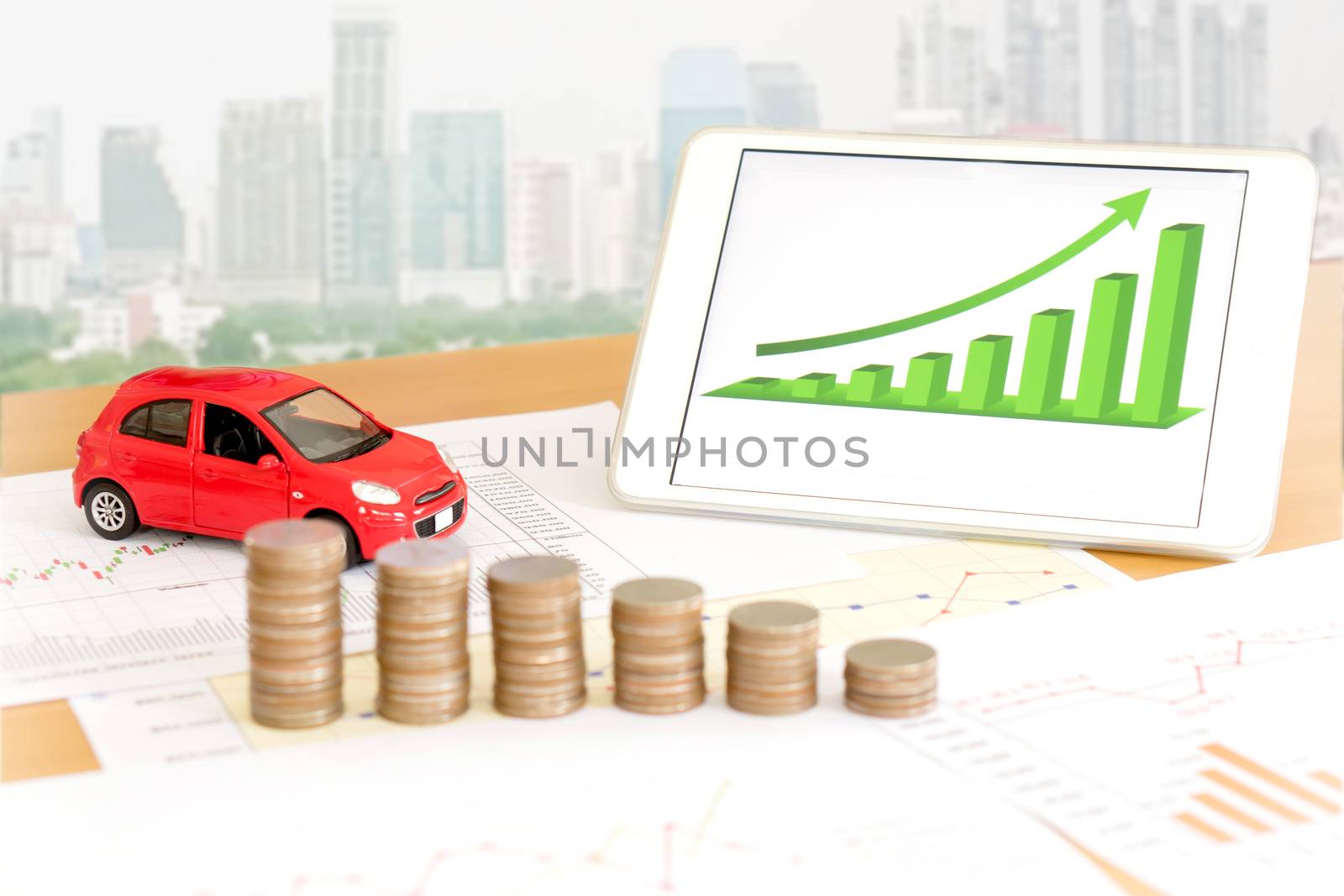 Photo of document some graphics with calculator and car and money