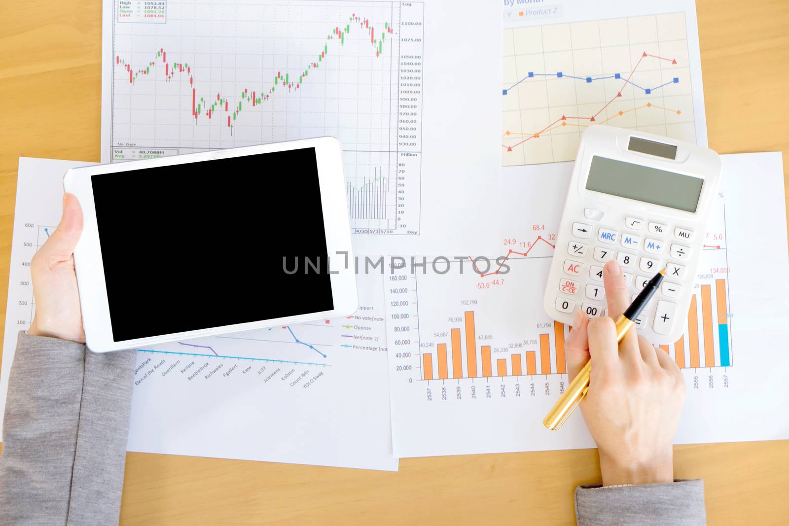 Close-up Of Businesswoman With Digital Tablet And Document