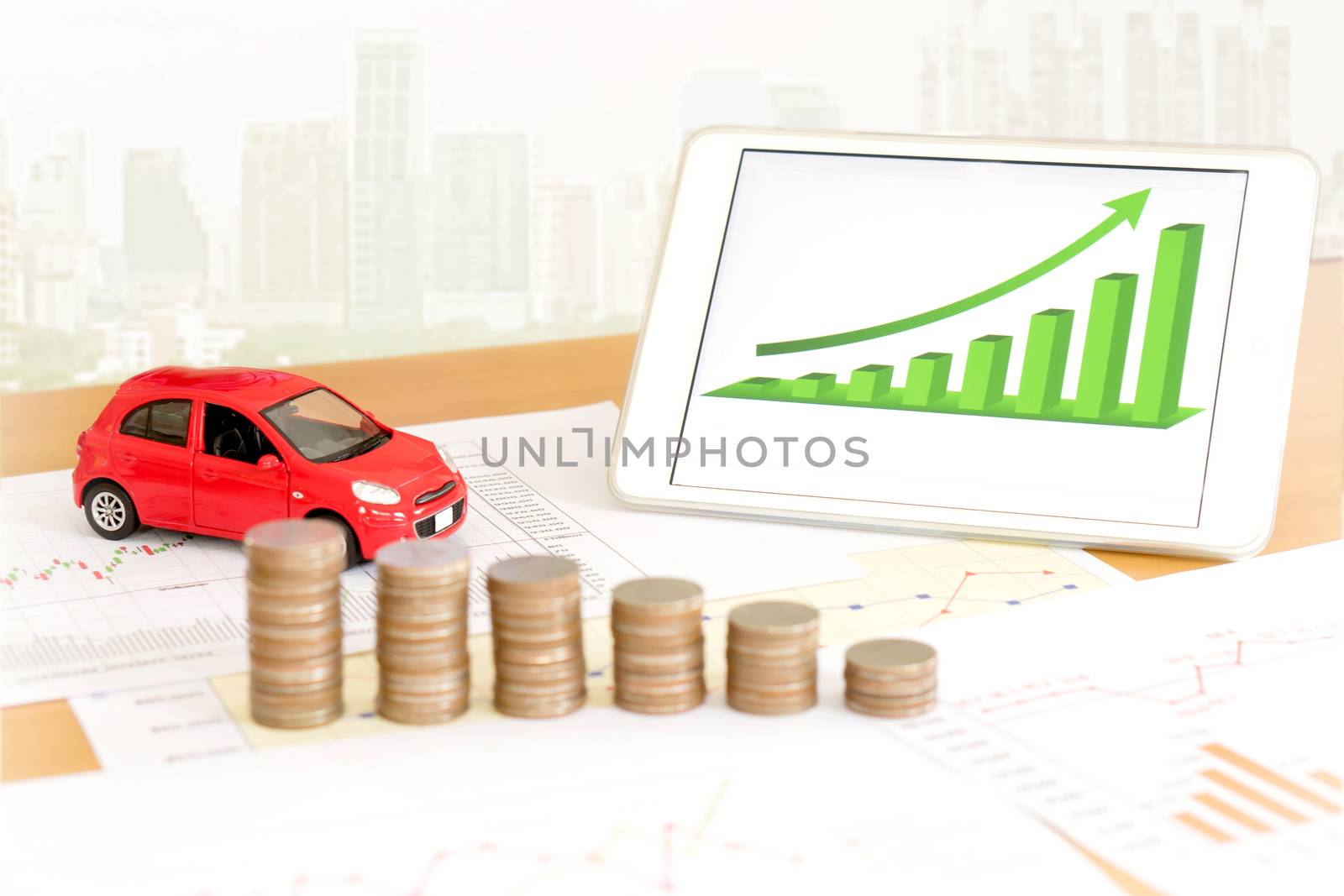 Photo of document some graphics with calculator and car and money