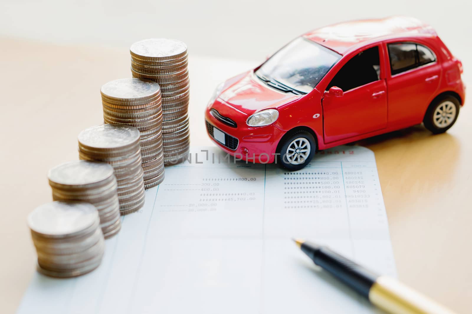 money, pile coin with saving book and car, concept