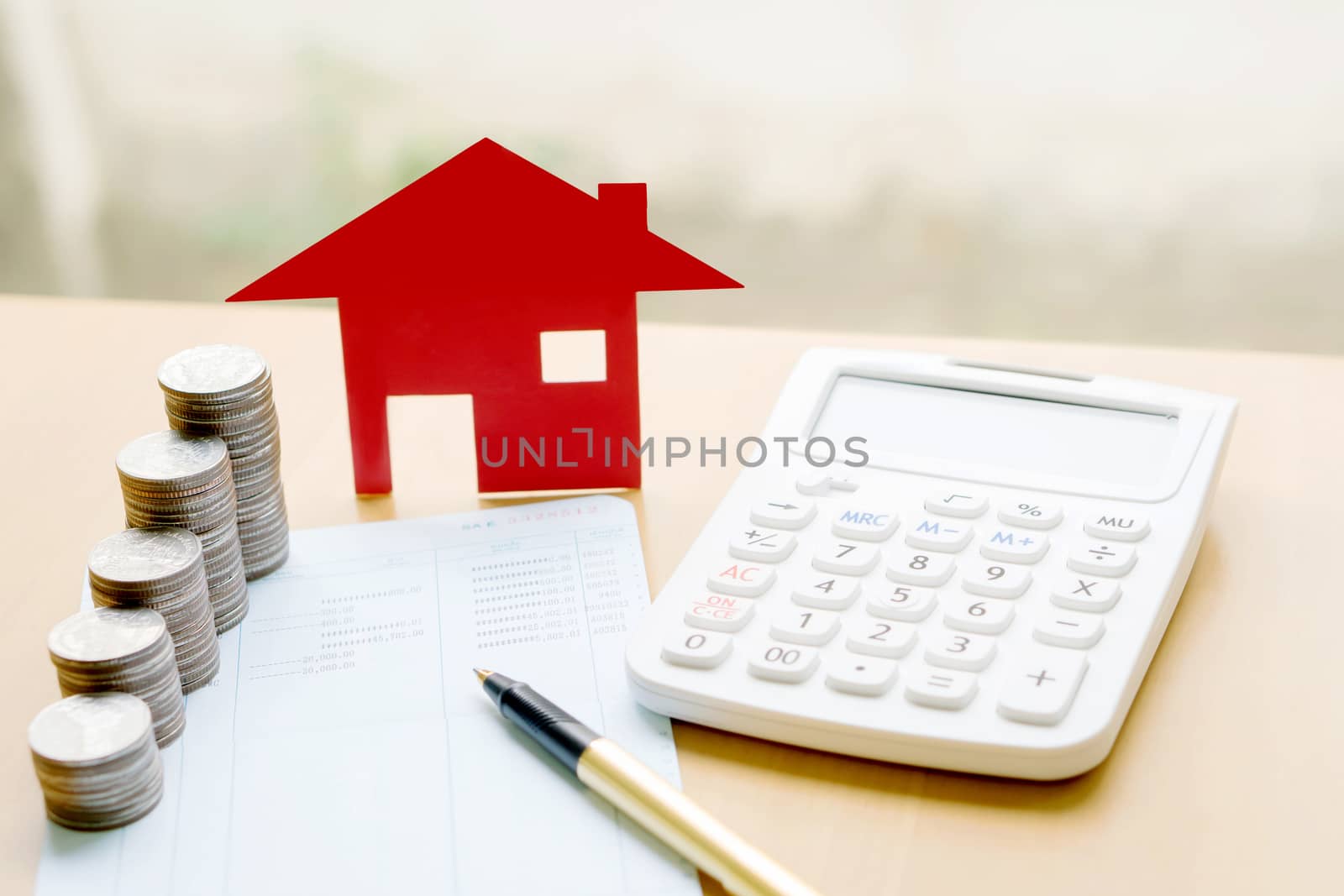 money, pile coin with saving book and paper home,concept