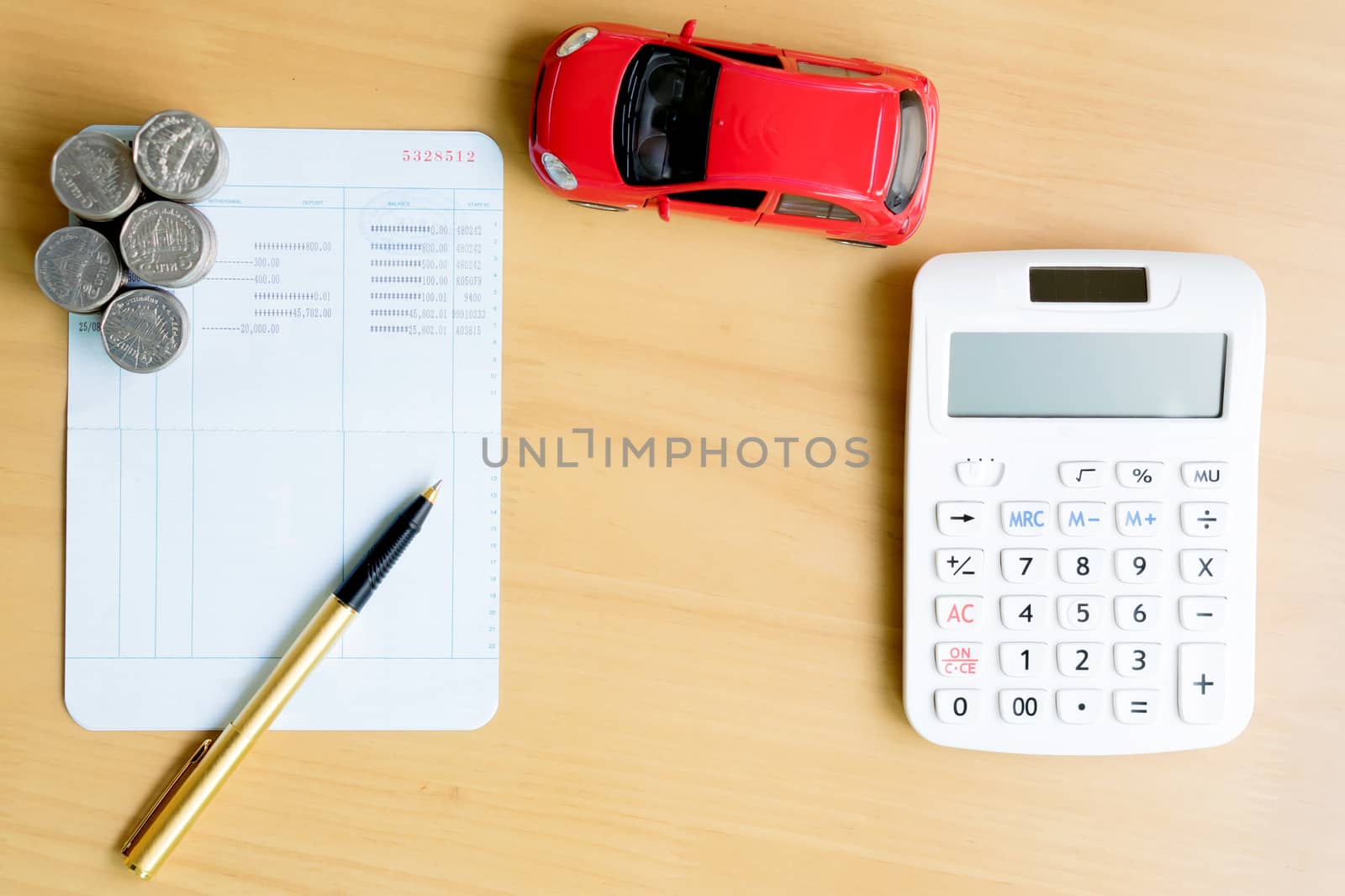 Coins stack in columns, saving book, car. Finance and banking concept.