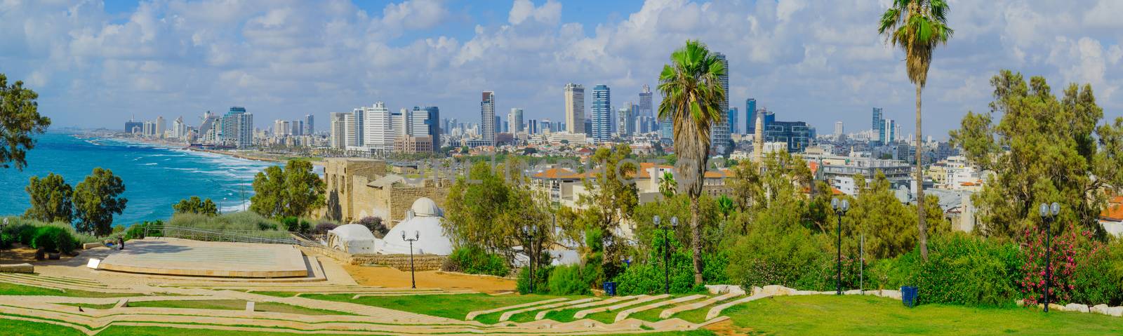 TEL-AVIV, ISRAEL - MAY 27, 2016: Panoramic view of the coast and skyline of Tel-Aviv, as viewed from Jaffa, with locals and visitors, in Tel-Aviv Yafo, Israel