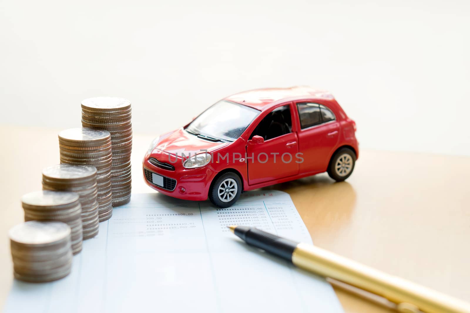 money, pile coin with account book and car, concept