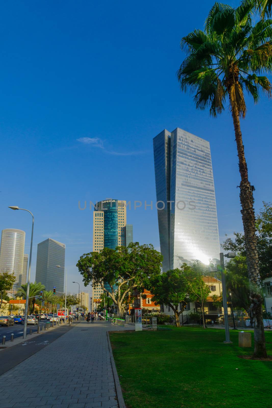 TEL-AVIV, ISRAEL - NOVEMBER 13, 2017: Scene of the center of the city, on Kaplan street, with locals, visitors, traffic and skyline, in Tel-Aviv, Israel