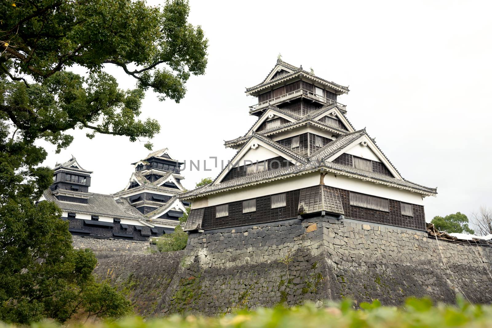 KUMAMOTO - DEC,16 : Landscape of Kumamoto castle, a hilltop Japanese castle located in Kumamoto Prefecture on the island of Kyushu.The main castle was damaged by earthquake and now repairing. JAPAN DEC,16 2016