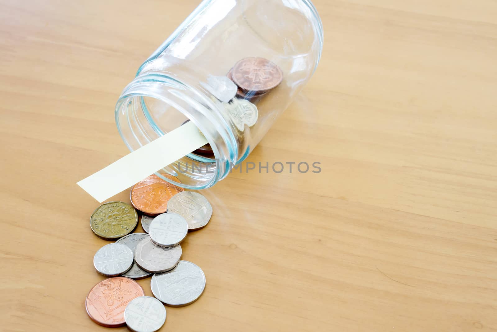 Money jar for savings by ekachailo
