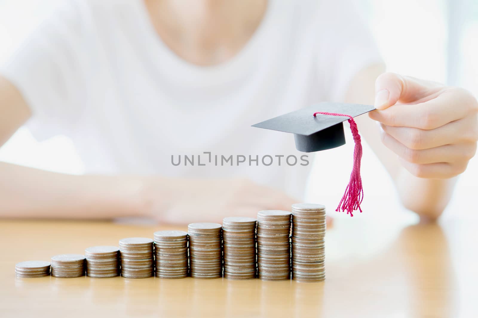 Woman saving education coins