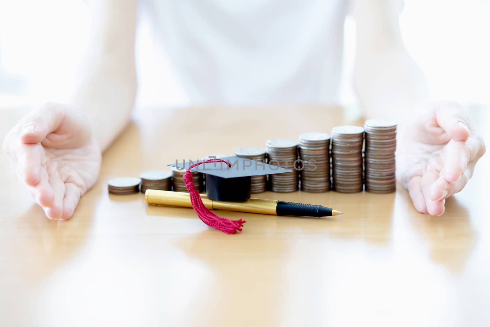 Woman saving education coins