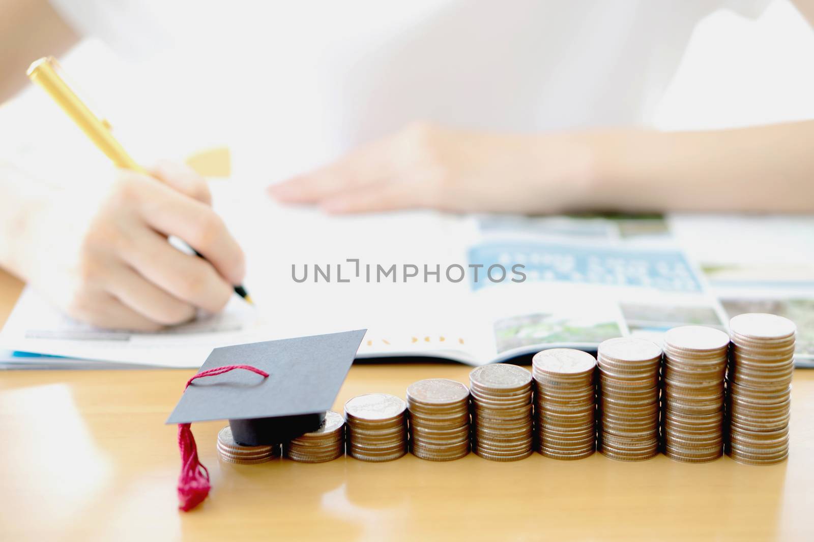 Woman writing on paper