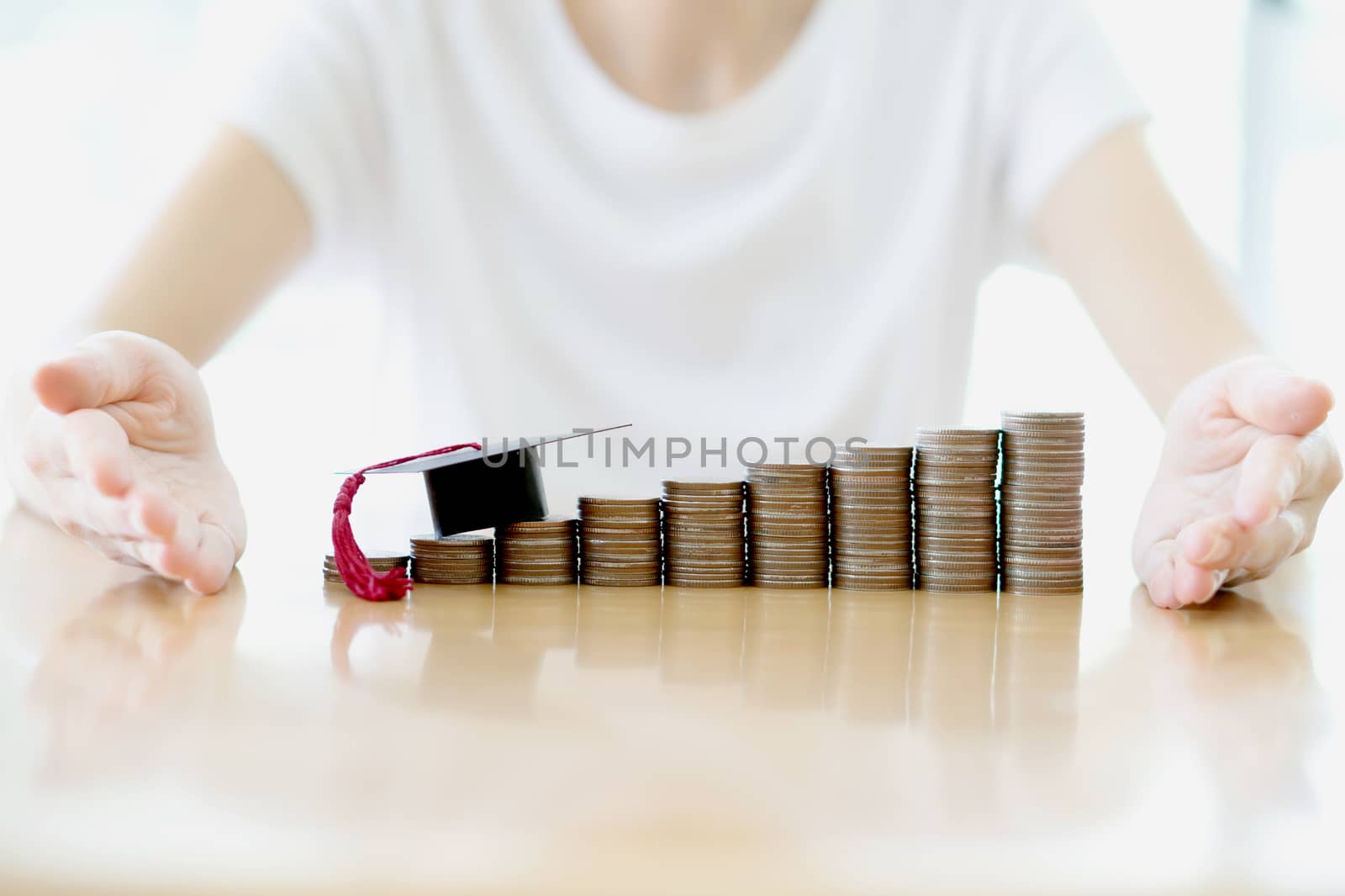 Woman saving education coins