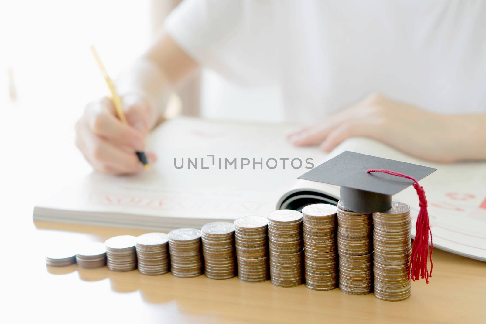 Woman writing on paper