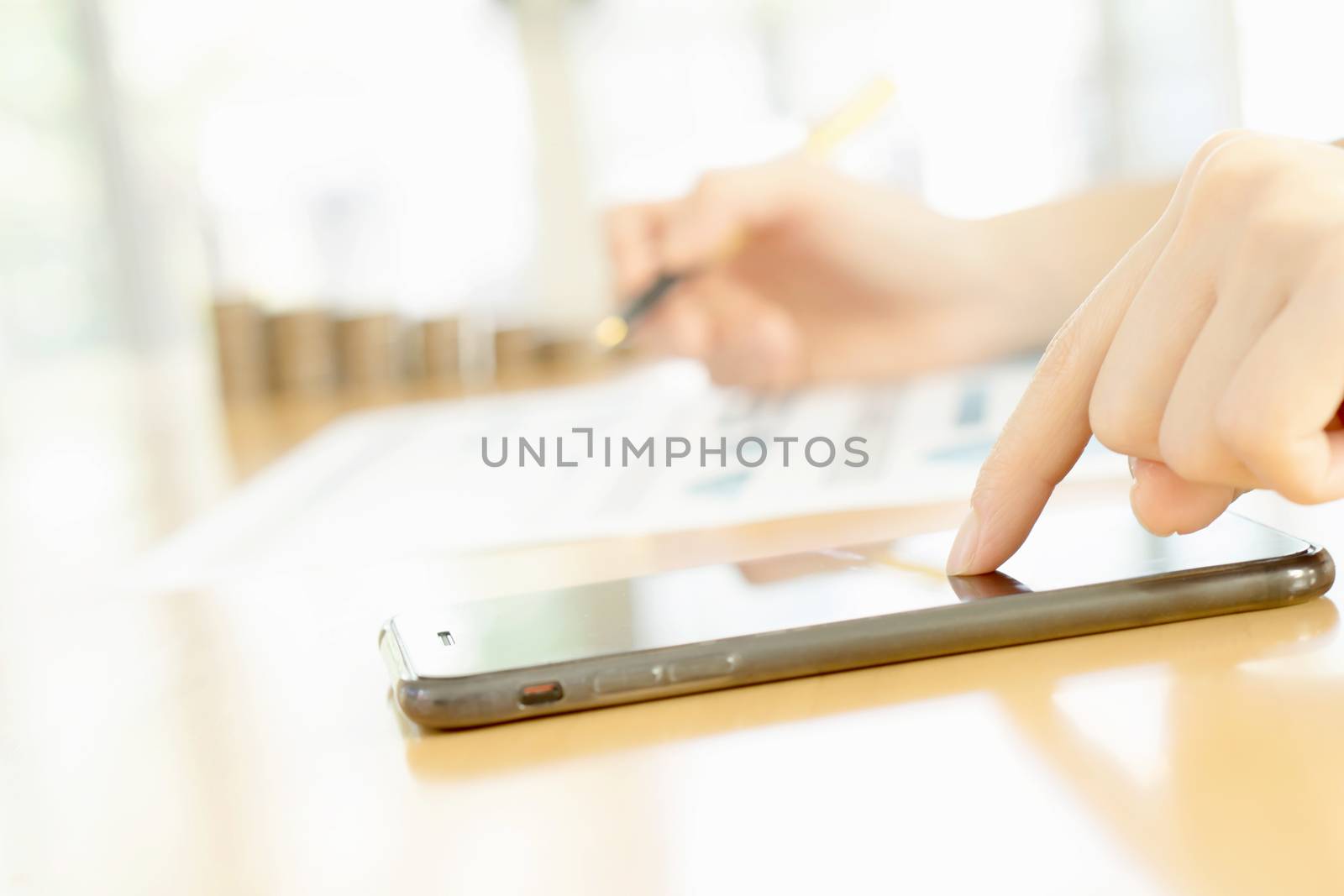 Women using her Smartphone 