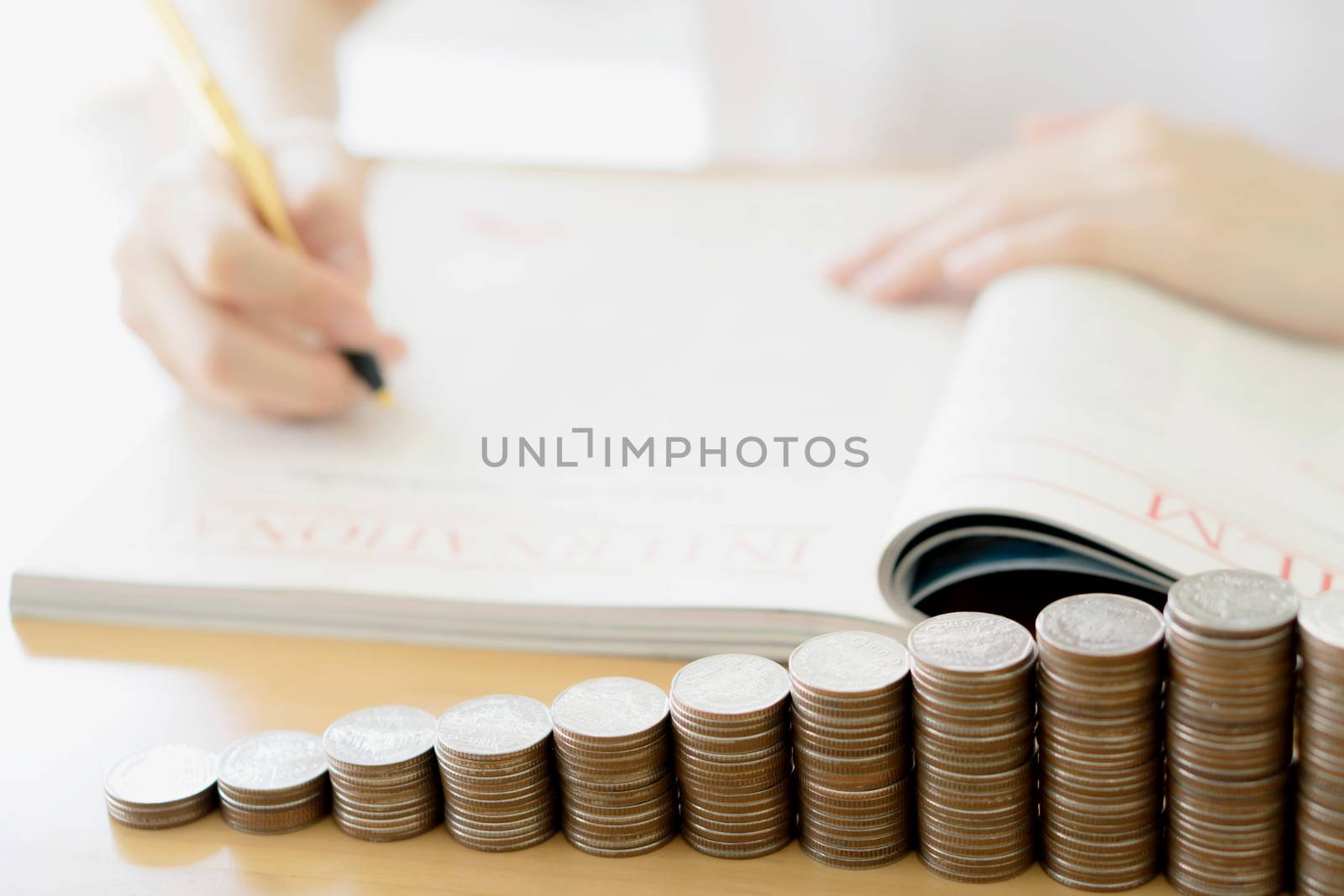 Woman writing on paper