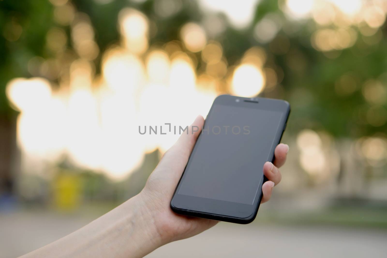 Woman using her Mobile Phone