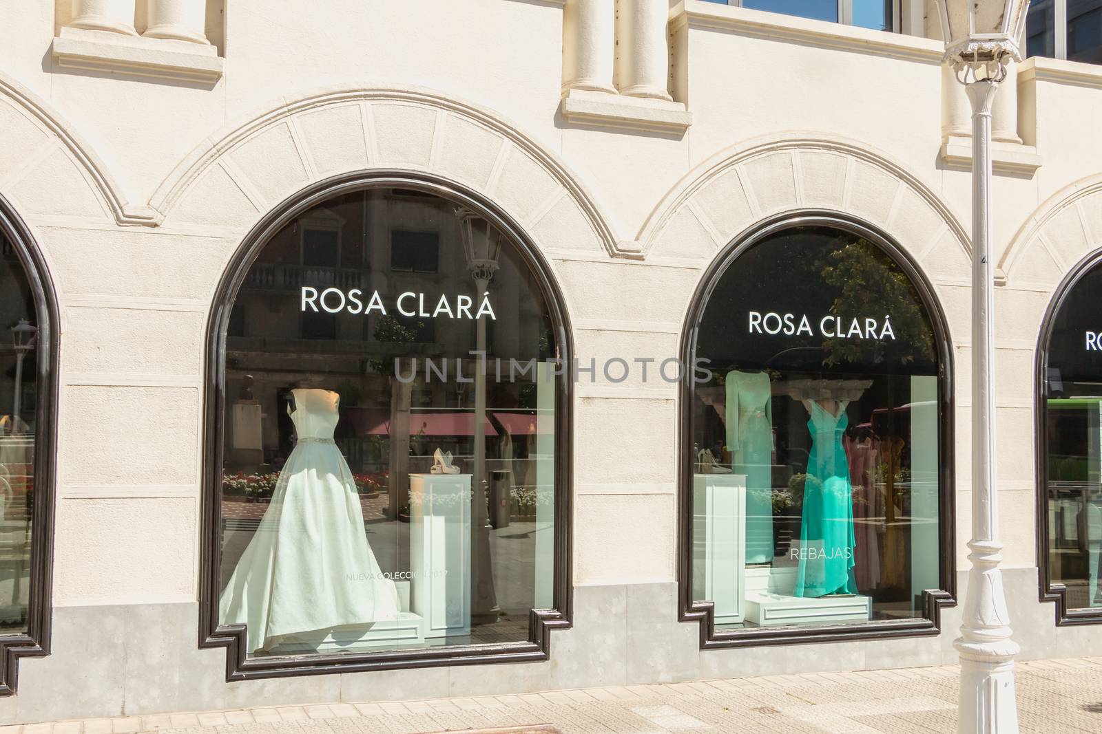VALENCIA, SPAIN - July 19, 2016 : showcase of a luxury clothes store Rosa Clara in the city center on a summer day
