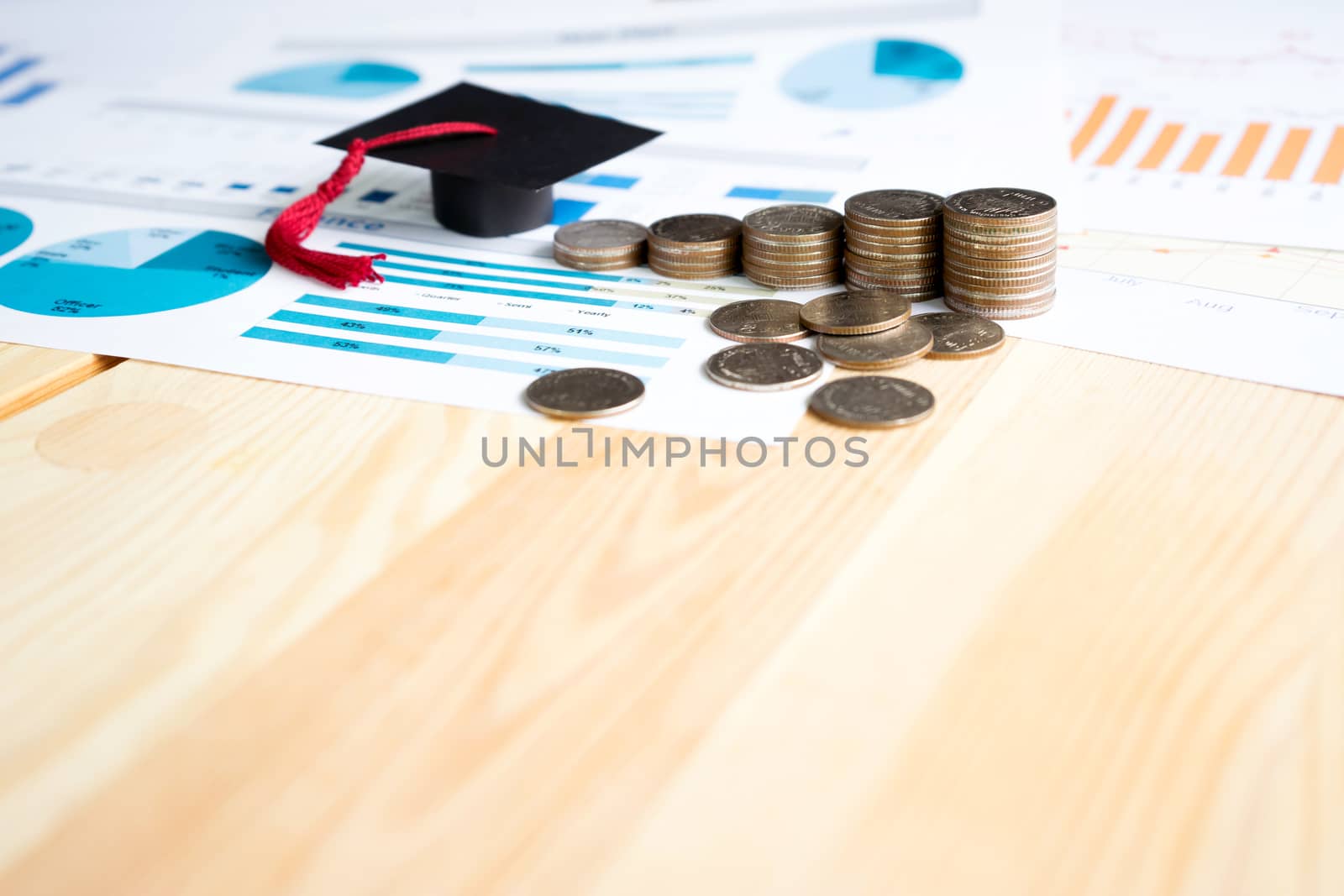Money, chart and Graduation caps by ekachailo