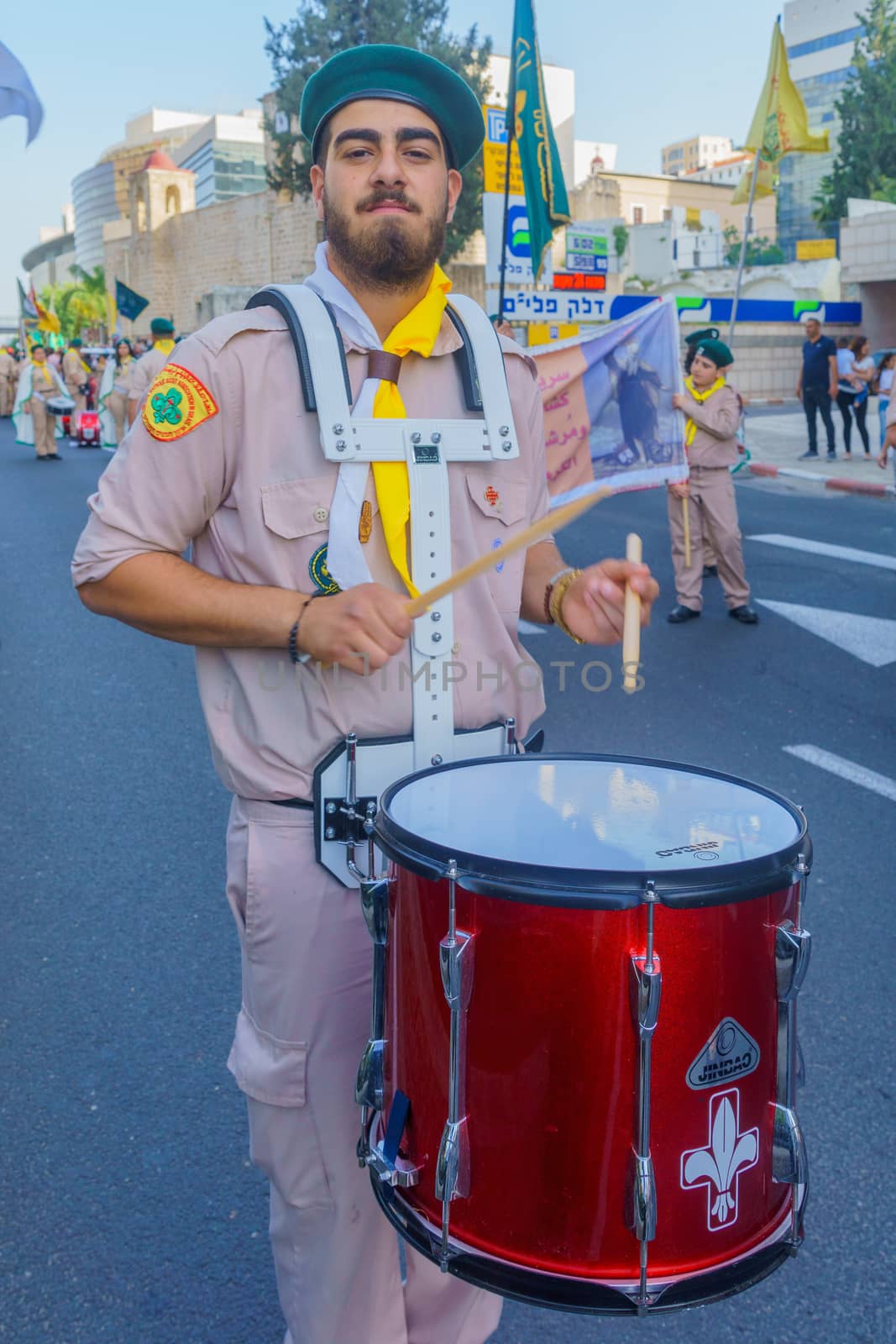 Haifa, Israel - April 27, 2019: Scouts take part in a Holy Saturday parade, part of Orthodox Easter celebration in Haifa, Israel