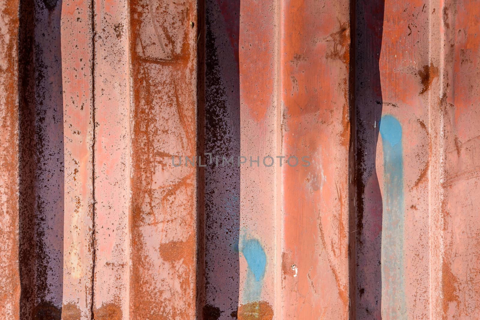 Warm texture of old messy colored rust metal