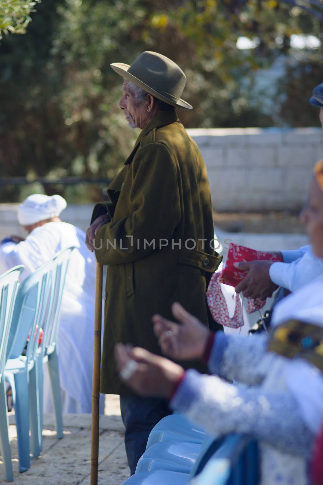 JERUSALEM - NOV 20, 2014: An Ethiopian Jewish man prays at the Sigd, in Jerusalem, Israel. The Sigd is an annual holiday of the Ethiopian Jews