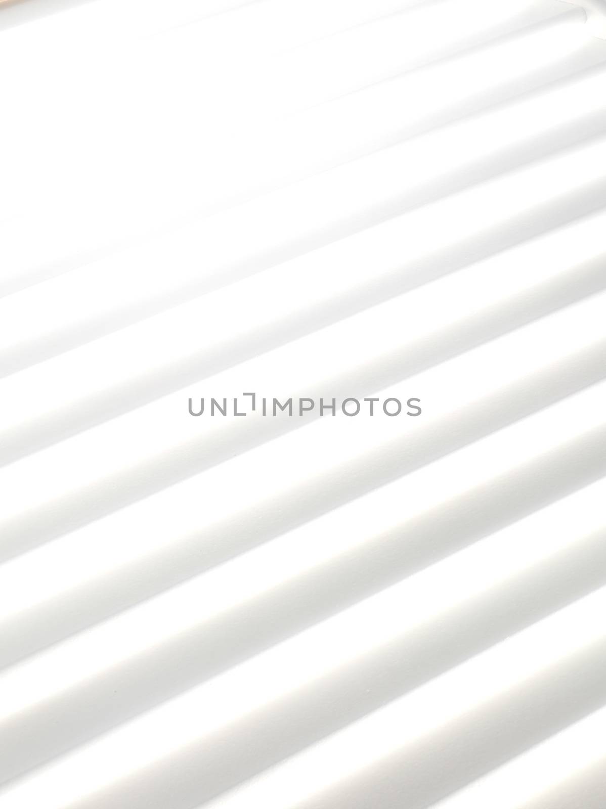 An abstract detail of a withe shutter, useful for background