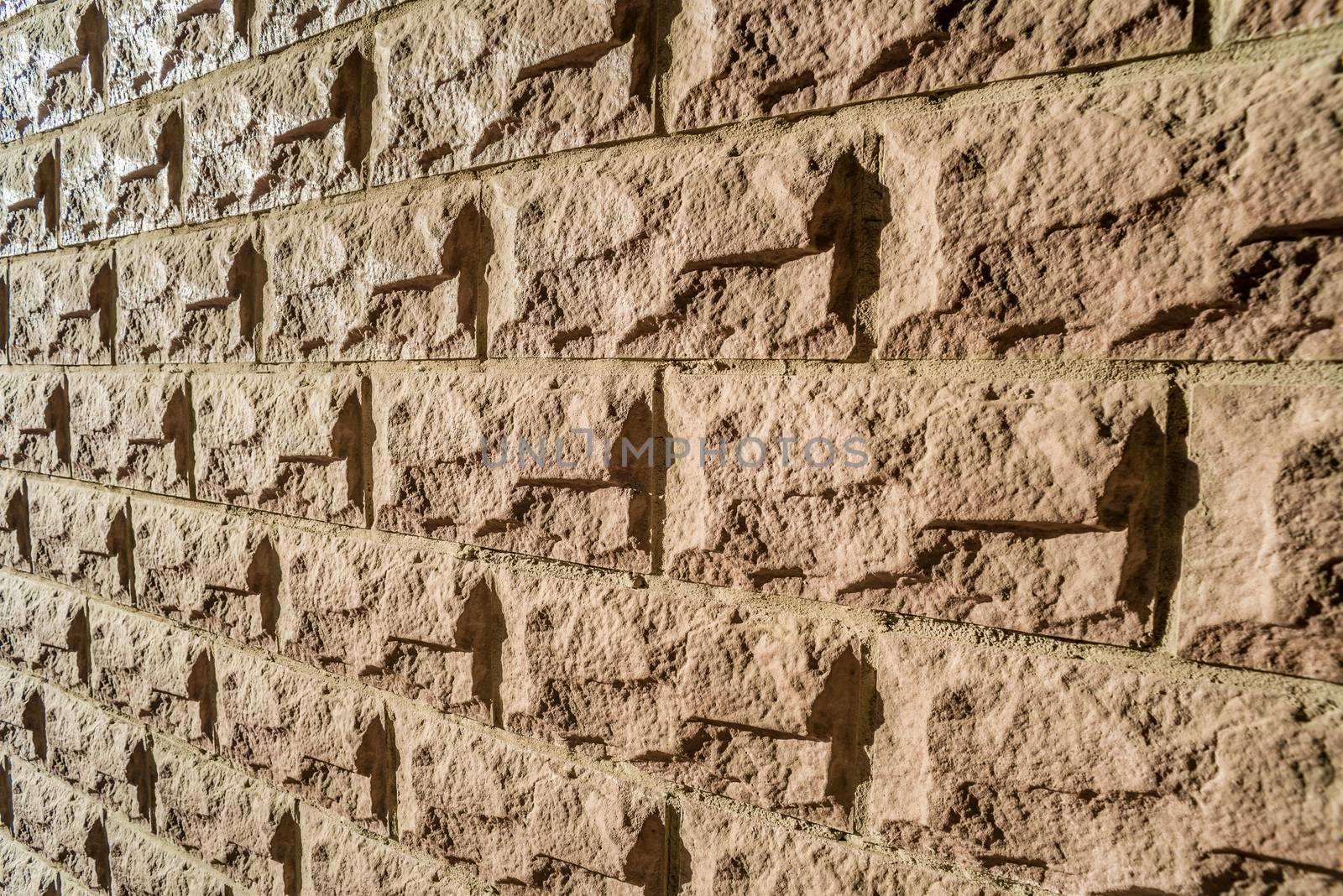 A modern stone wall with perspective effect and vanishing lines