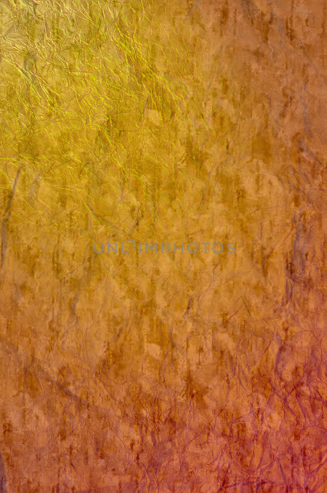 A colored crumpled orange paper texture for background use