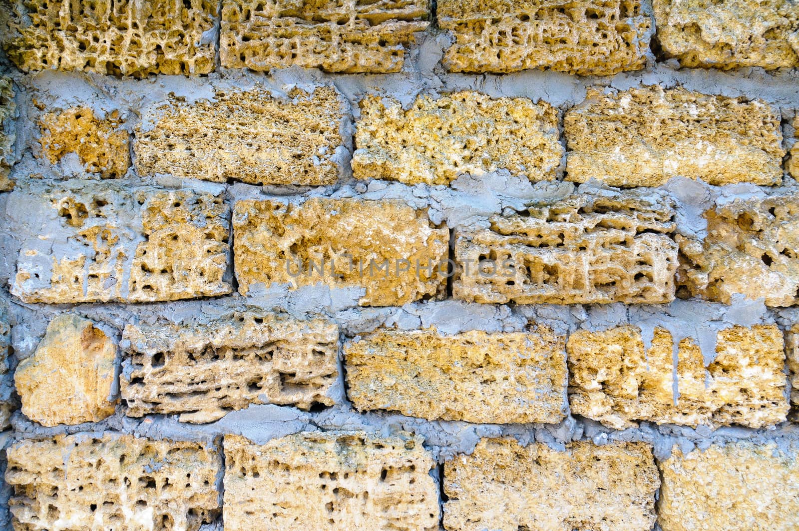 A wall of bricks in a house in construction