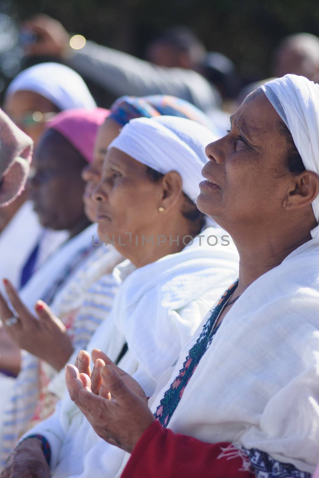 JERUSALEM - NOV 20, 2014: Ethiopian Jewish women pray at the Sigd, in Jerusalem, Israel. The Sigd is an annual holiday of the Ethiopian Jews