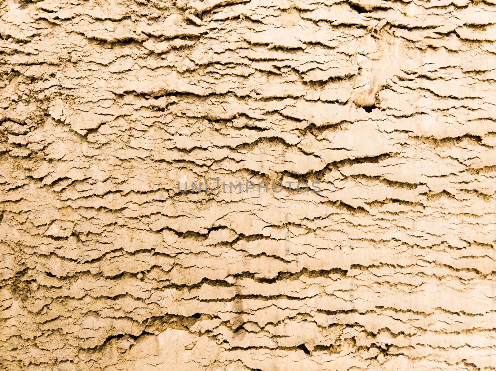 Compressed sand texture on a construction site. Useful as background of bump texture for 3d rendering. Copy space