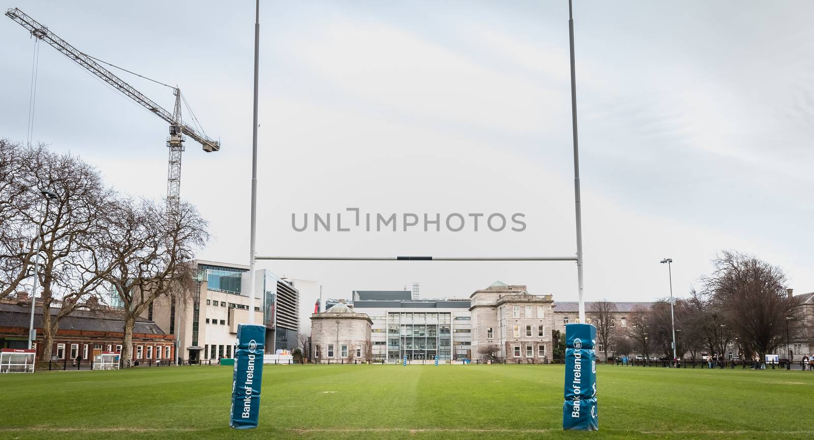 Dublin, Ireland - February 11, 2019: View of Trinity College football field in historic downtown on a winter day