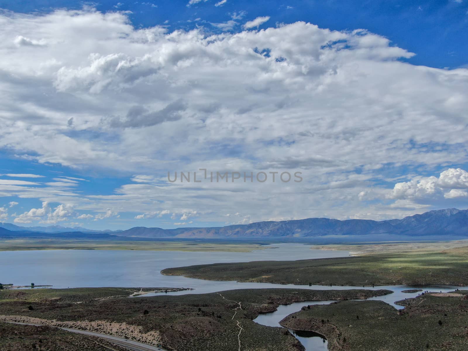 Aerial view of Lake Crowley over the mountain during hot summer day. Mono County, California, USA