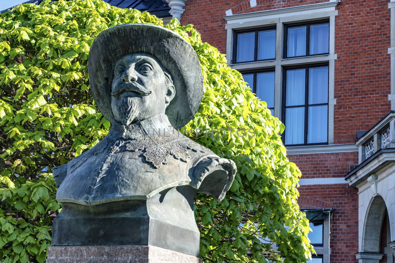 UMEA, SWEDEN - JUNE 10, 2020: A bust of Umea's founder, Gustav II Adolf, made of bronze. Placed in front of Town Hall, Vasterbotten, side view by skydreamliner