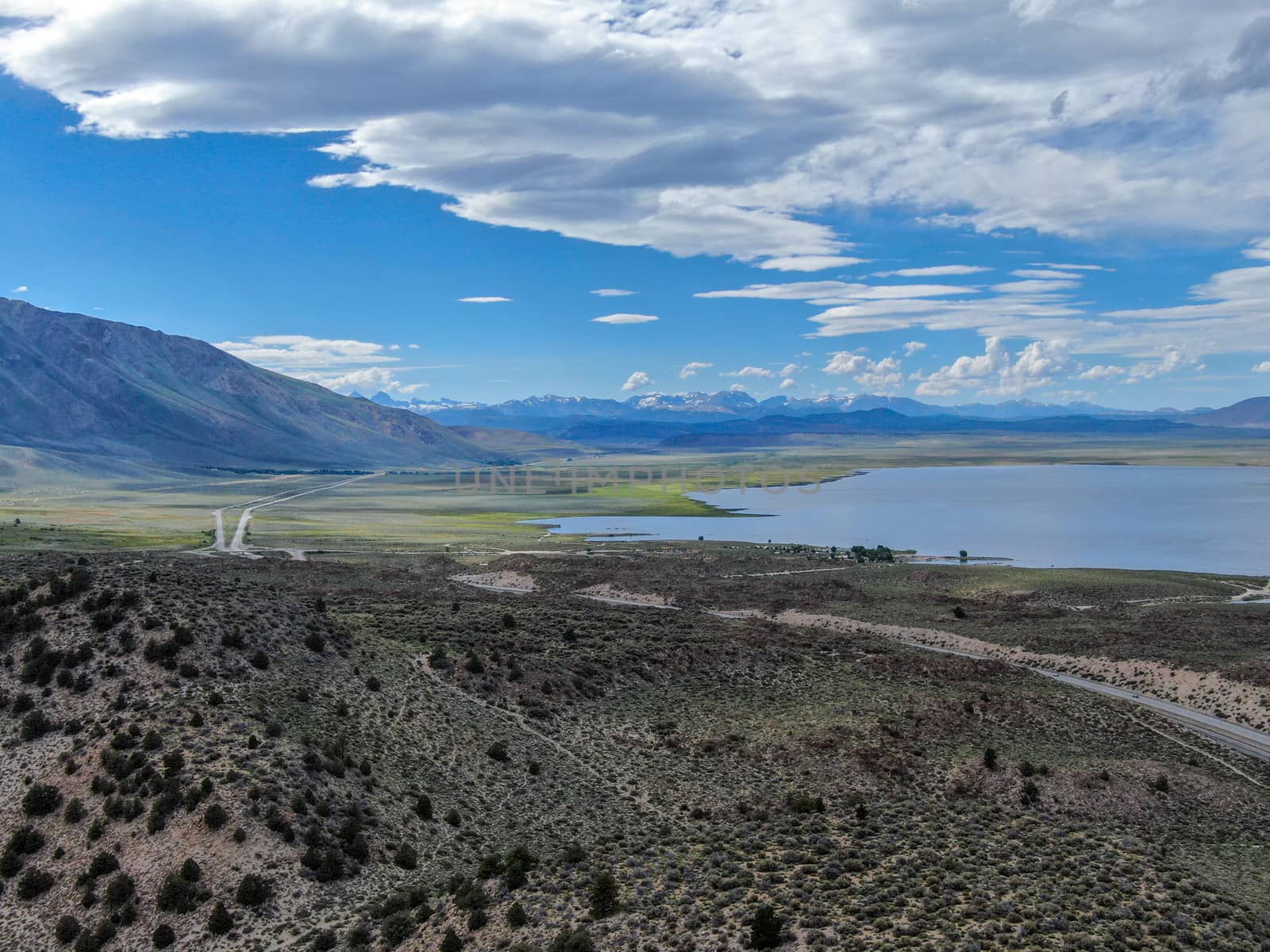 Aerial view of Lake Crowley over the mountain during hot summer day. Mono County, California, USA